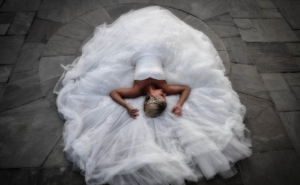 Bride laying on a beautiful
