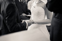 wedding couple keeping arms during vows