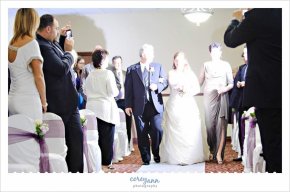 guest flash damaging photo during processional during wedding ceremony